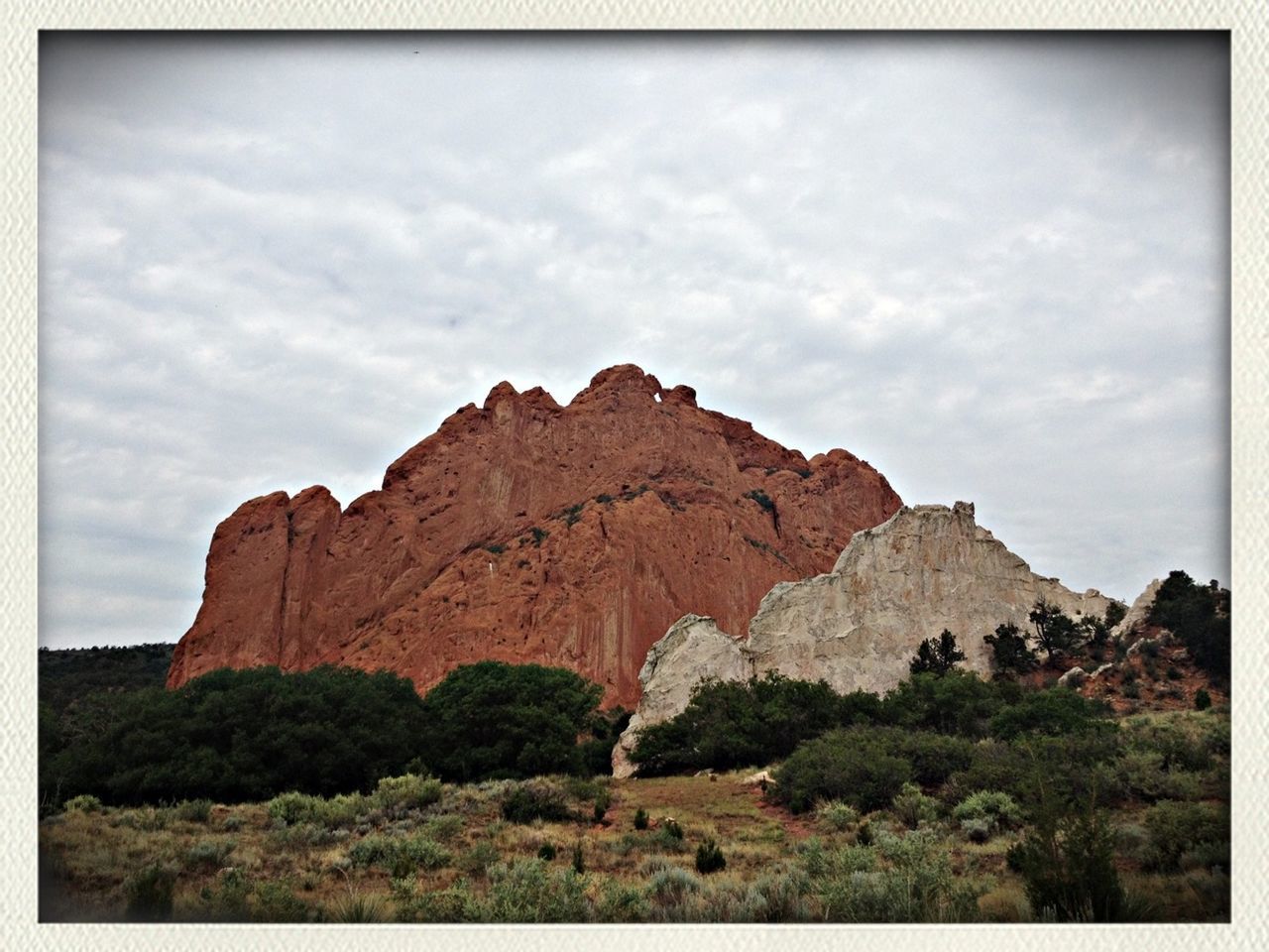 transfer print, sky, auto post production filter, tranquility, rock formation, tranquil scene, scenics, rock - object, nature, landscape, beauty in nature, cloud - sky, cloud, mountain, non-urban scene, tree, rock, cliff, low angle view, geology