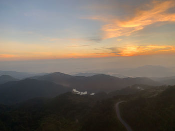 Scenic view of mountains against sky during sunset