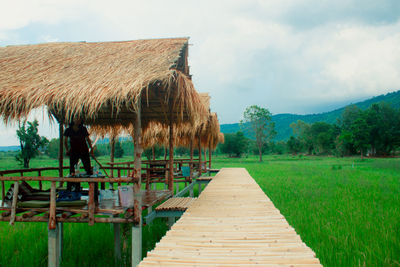 Panoramic view of roof and houses against sky