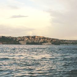 View of city against cloudy sky