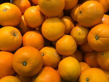 Full frame shot of oranges for sale at market