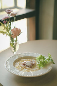 Close-up of food in plate on table