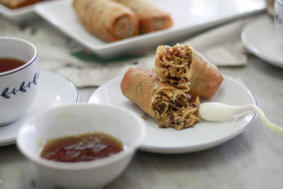 Close-up of breakfast served on table