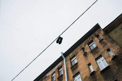 Low angle view of street light against sky