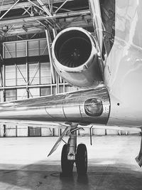 Low section of man standing on airplane