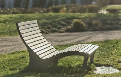 Close-up of empty seats in grass