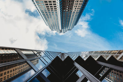 Low angle view of modern buildings against sky