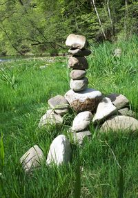 Stack of stones on field