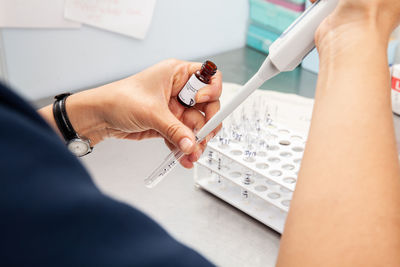 Scientist preparing samples for flow cytometric analysis using a cd38 monoclonal antibody.