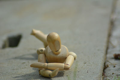 Close-up of stuffed toy on wood