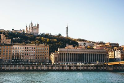 Scenic view of city against clear sky