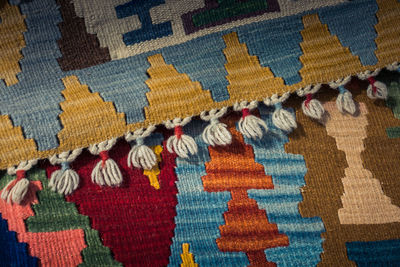 Full frame shot of multi colored umbrellas on carpet