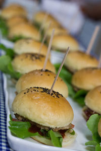 Close-up of burgers served on table