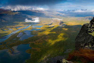 Beautiful, wild arctic valley viewed from mountain top in epic early morning light. 