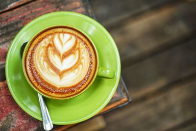 High angle view of cappuccino on table