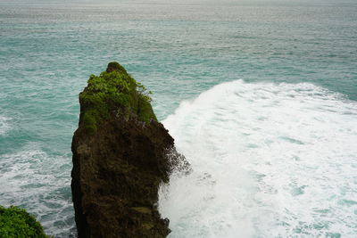 Scenic view of rocks in sea