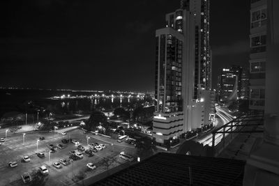 Illuminated buildings in city at night