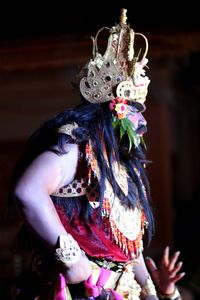 Close-up of man performing traditional dancing