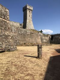 Old building against clear blue sky