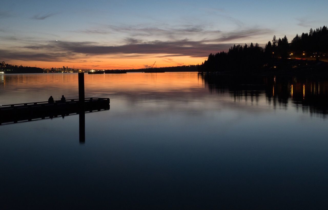 water, sunset, reflection, silhouette, sky, tranquility, tranquil scene, lake, scenics, beauty in nature, waterfront, nature, pier, dusk, idyllic, cloud - sky, calm, cloud, jetty, river