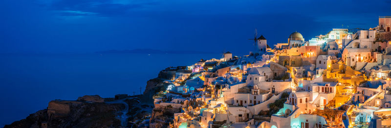 Buildings in city at night