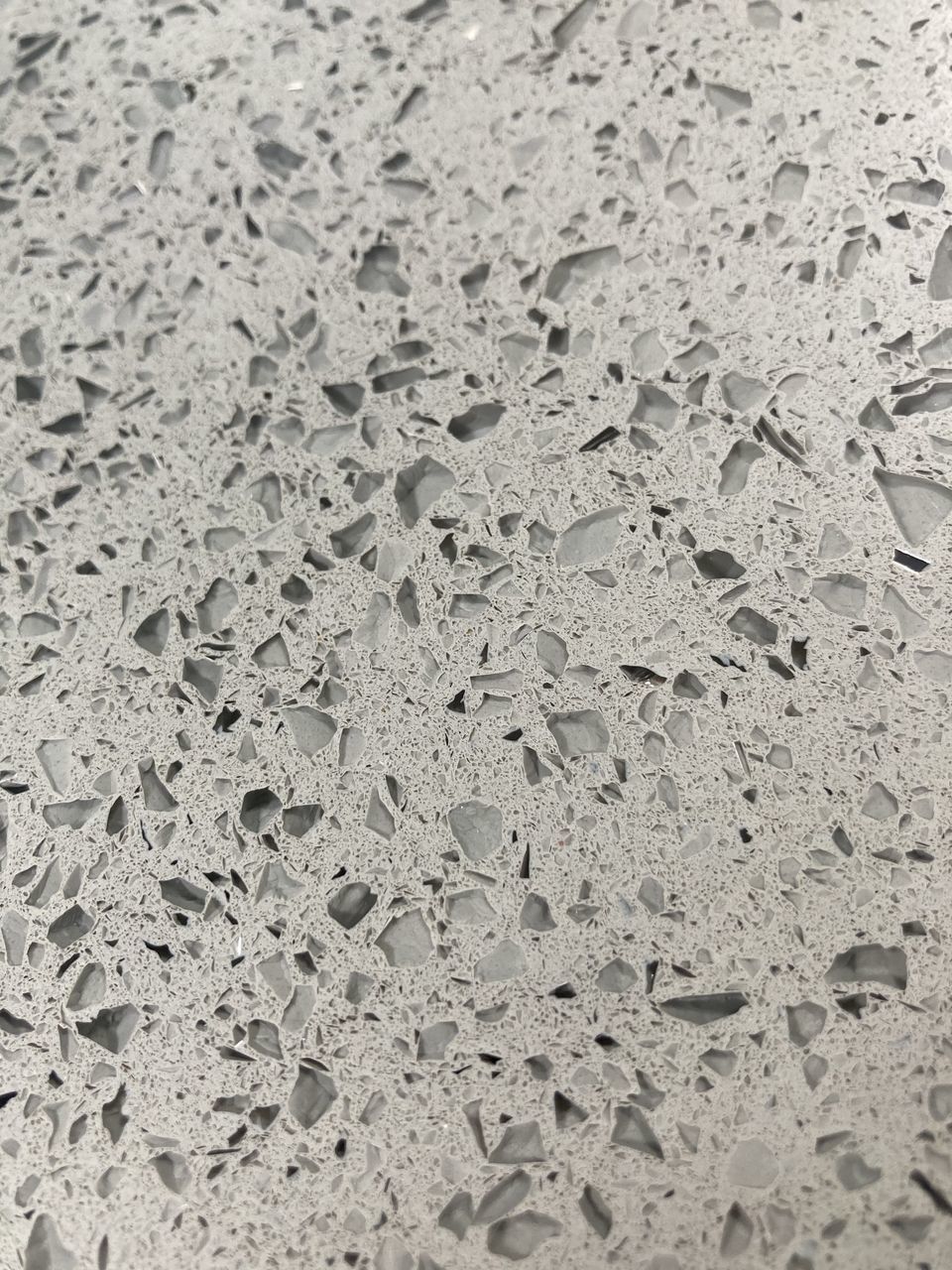 CLOSE-UP OF WET SAND