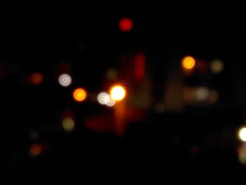 Defocused image of illuminated lights at night