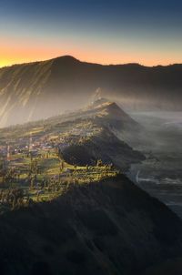 Aerial view of landscape against sky during sunrise at bromo mountain, indonesia