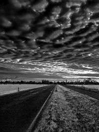 View of road against cloudy sky