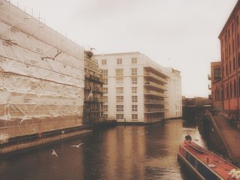 View of residential buildings against sky