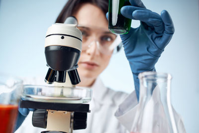 Close-up of scientist working in laboratory