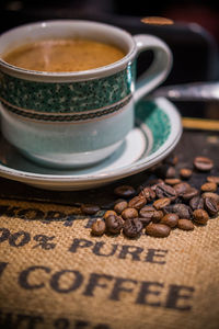 Close-up of coffee beans on table