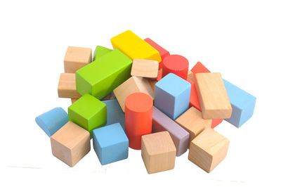 High angle view of multi colored toy against white background