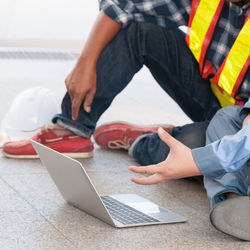 High angle view of man using mobile phone