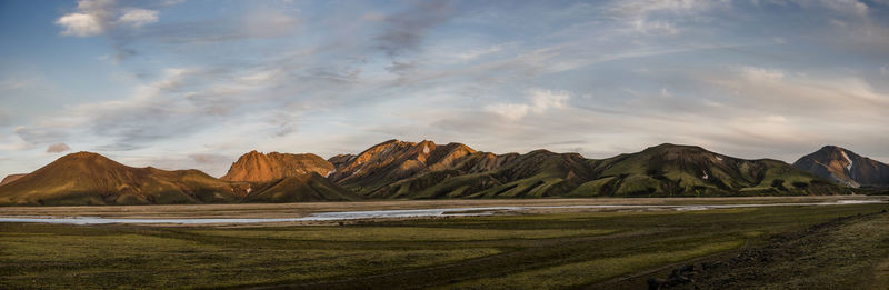 Panoramic view of landscape and mountains against sky