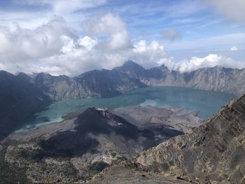 Scenic view of landscape and mountains against sky