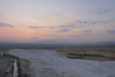 Scenic view of landscape against sky during sunset