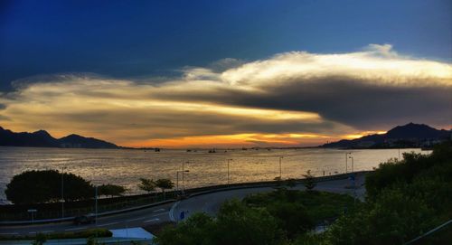 Scenic view of sea against cloudy sky