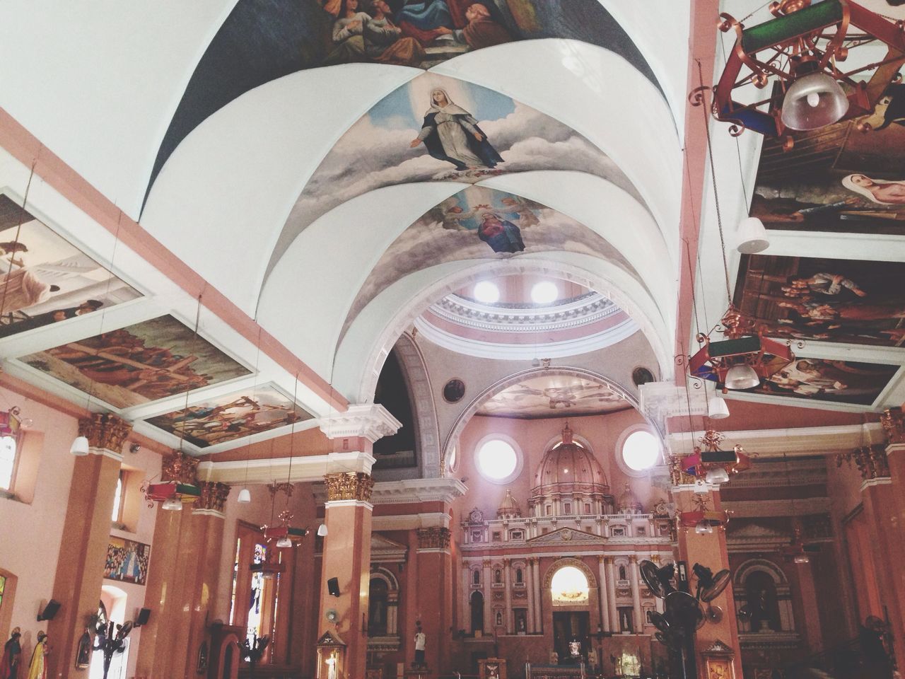 place of worship, religion, architecture, indoors, spirituality, built structure, low angle view, ceiling, illuminated, decoration, lighting equipment, church, hanging, arch, ornate, chandelier, temple - building, architectural feature