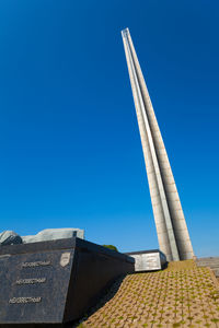 Low angle view of building against blue sky