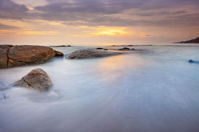 Scenic view of sea against sky during sunset