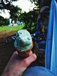Cropped hand holding ice cream