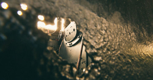 High angle view of illuminated lighting equipment on beach