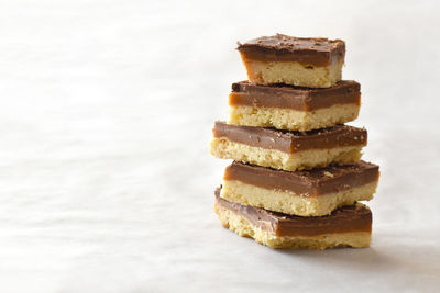 Close-up of chocolate stack against white background