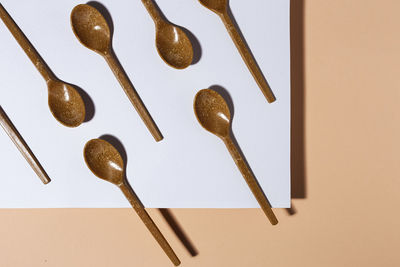 High angle view of bread on table against white background