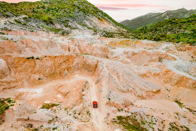 High angle view of car in open mine pit