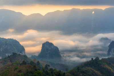 Scenic view of mountains against sky during sunset