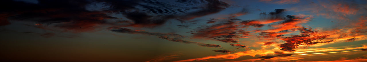 Low angle view of dramatic sky during sunset