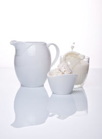 Close-up of drink in bowl against white background