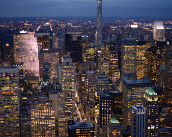 High angle view of illuminated cityscape at night